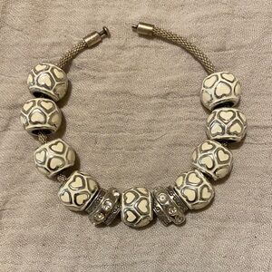 9 Brighton heart beads with 2 Brighton crystal beads as spacers